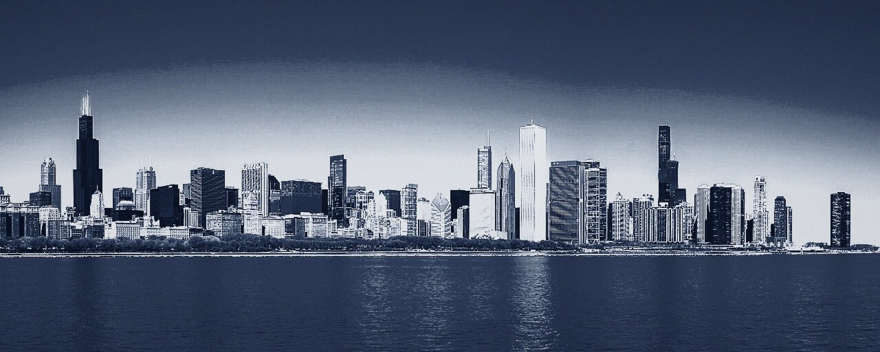 The Chicago financial district under low light, treated to deep navy
